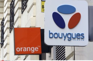 Orange and Bouygues mobile phones shops are pictured in Marseille, southern France, Thursday, Jan. 7, 2016. Orange SA is in talks to acquire Bouygues SA. French phone carriers have struggled to sustain domestic sales and earnings growth since Internet-service provider Iliad entered the mobile market in 2012 with discounted offers. (AP Photo/Claude Paris)/NYOTK/458052869771/1601071717